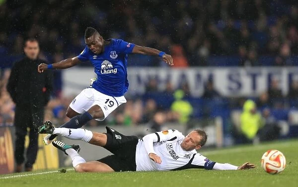 Granqvist vs Atsu: Intense Slide Tackle in Everton vs FK Krasnodar (UEFA Europa League - Group H)
