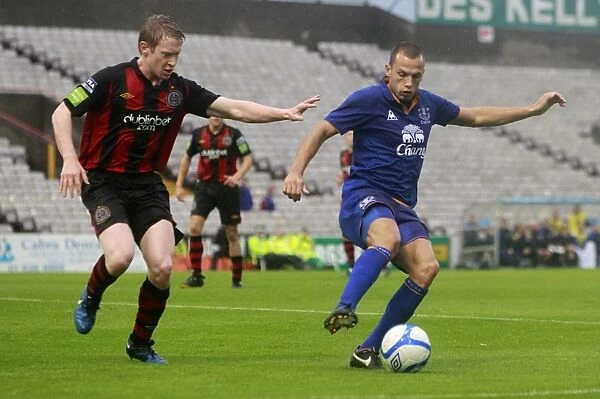 Heitinga vs. Flood: A Football Battle for the Ball - Everton's John Heitinga vs. Bohemians Anto Flood (15 August 2011)