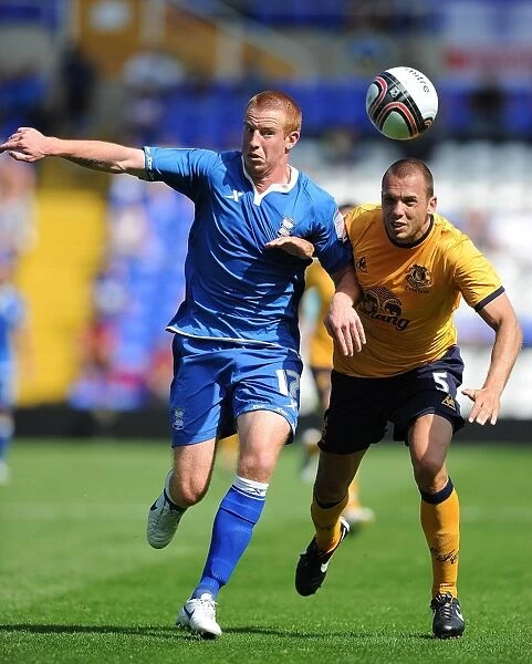 Heitinga vs Rooney: A Tense Showdown in Everton's Pre-Season Clash with Birmingham City (30 July 2011)