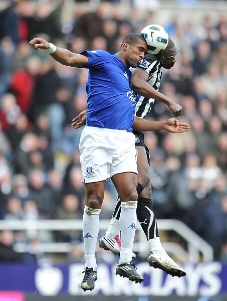 Intense Battle: Distin vs Ameobi at St. James Park - Everton vs Newcastle United, Barclays Premier League (2011)