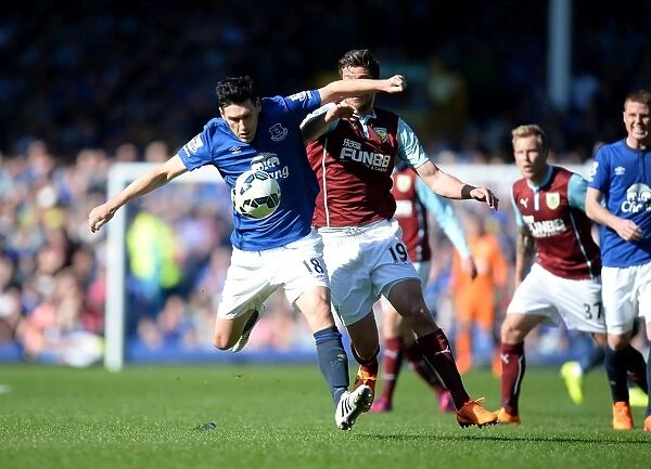 Intense Rivalry: Barry vs Jutkiewicz - Everton vs Burnley's Battle for Supremacy
