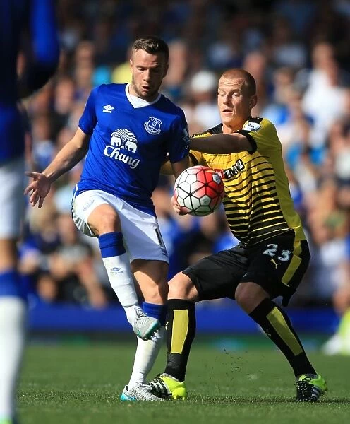 Intense Rivalry: Cleverley vs Watson's Battle for Ball Supremacy - Everton vs Watford, Premier League, Goodison Park