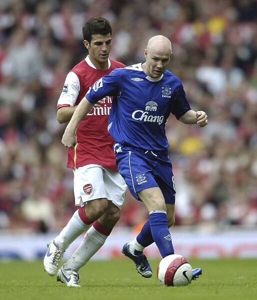 Intense Rivalry: Fabregas vs. Johnson - Arsenal vs. Everton: A Football Battle