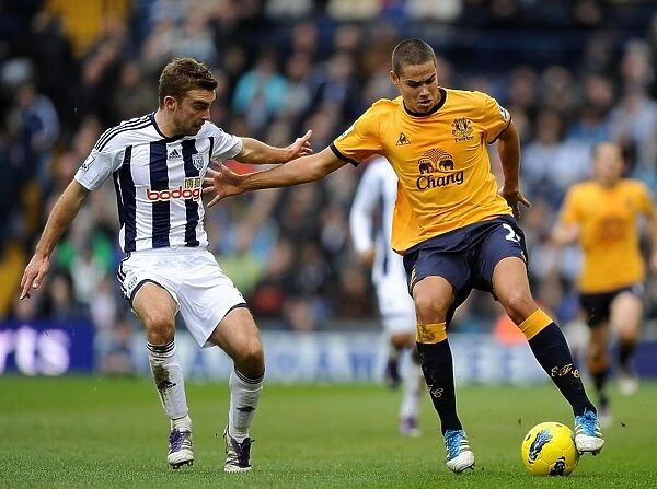 Intense Rivalry: Jack Rodwell vs. James Morrison Battle for Ball Supremacy in Barclays Premier League Clash at The Hawthorns