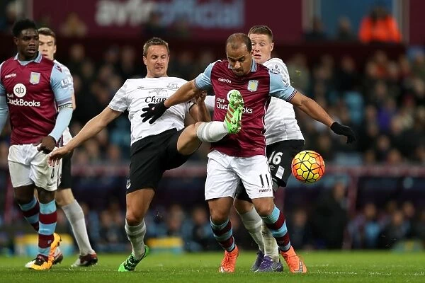Intense Rivalry: Jagielka vs Agbonlahor's Battle for Ball Supremacy - Aston Villa vs Everton, Premier League