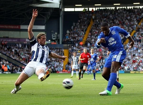 Jonas Olsson Blocks Victor Anichebe's Shot: West Bromwich Albion vs. Everton (01-09-2012)