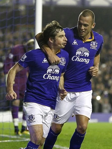 Leighton Baines Scores and Celebrates with Heitinga: Everton's Penalty Goal vs. Wolverhampton Wanderers (Nov 2011)