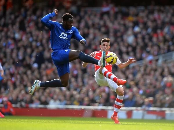 Lukaku vs. Gabriel: Intense Tackle in Arsenal vs. Everton Premier League Clash (2015)