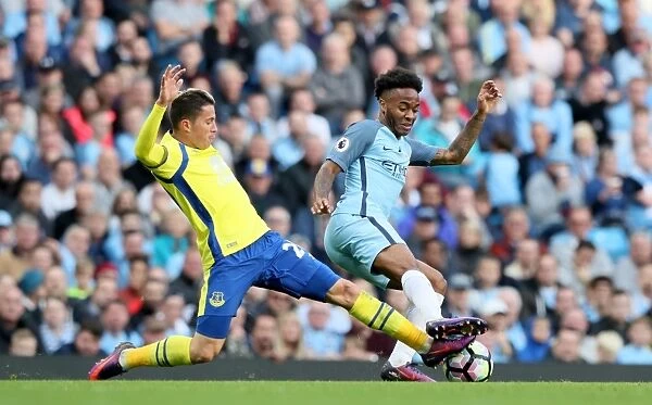 Manchester City vs. Everton: Bryan Oviedo vs. Raheem Sterling - Intense Battle for Ball Possession (Premier League)