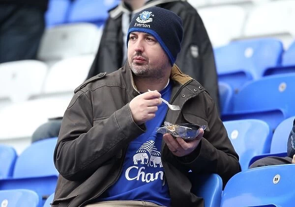 A Passionate Everton Fan's Pie Time at Goodison Park During the Everton vs Manchester United Barclays Premier League Match (29 October 2011)