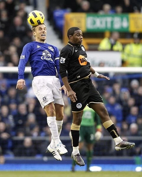 Phil Neville Wins Aerial Duel: Everton's Victory Over Wigan Athletic (11 December 2010, Goodison Park)