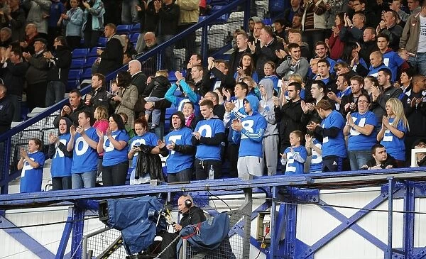 Proud to be Blue: Everton Fans Unite in Sea of T-Shirts at Goodison Park (Everton vs Wigan Athletic, Barclays Premier League, 17 September 2011)