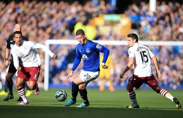 Ross Barkley in Action: Everton vs. Aston Villa, Premier League Rivalry at Goodison Park