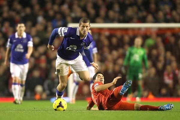 Ross Barkley Evades Luis Suarez: Everton vs. Liverpool's Intense Rivalry (4-0)