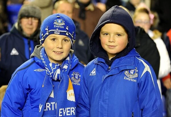 Sea of Passion: Everton FC's Unwavering Support Unfolds at Goodison Park (vs. Bolton Wanderers, November 10, 2010)