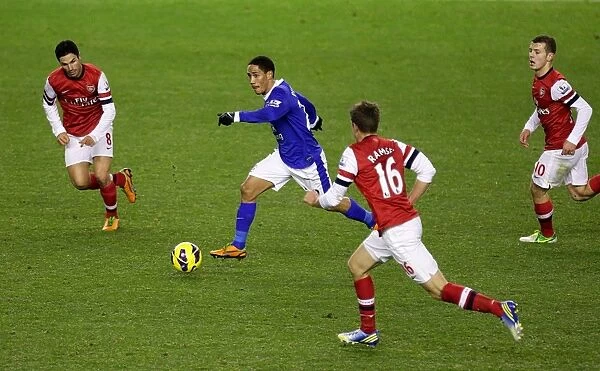 Steven Pienaar Charges Forward: Everton vs. Arsenal - Barclays Premier League Rivalry (1-1)