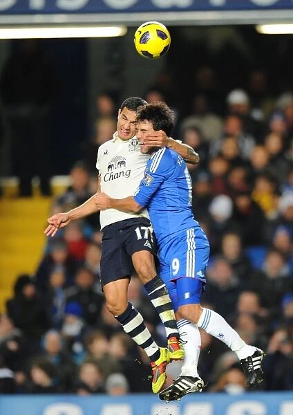 Tim Cahill vs. Paulo Ferreira: Premier League Battle - Everton's Clash with Chelsea (Dec. 4, 2010)