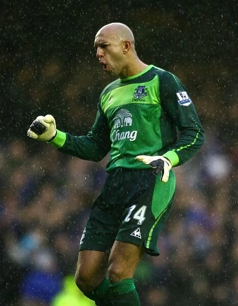Tim Howard and Louis Saha: Exulting in Everton's Thrilling Opening Goal vs. Blackpool (February 2011)