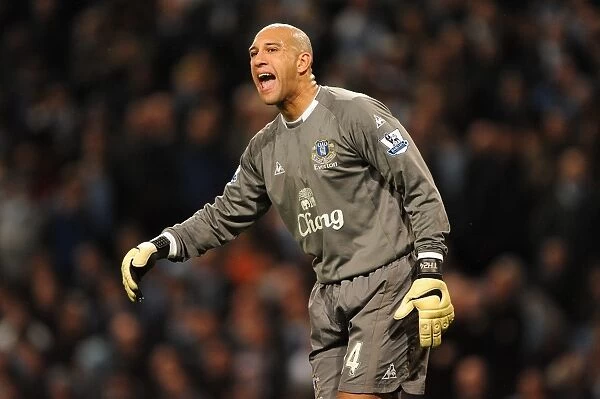 Tim Howard's Defensive Stand: Everton vs. Manchester City at City of Manchester Stadium (Premier League Soccer)