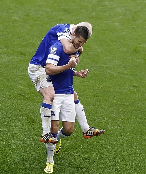 Triumphant Everton: Mirallas, Naismith, and Arteta's Own Goal - Everton's Historic 3-0 Victory over Arsenal (2014): Mirallas and Naismith Celebrate, Arteta Scores Own Goal