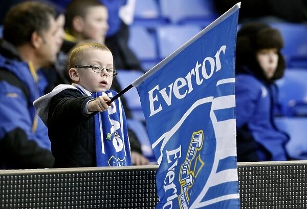 Young Everton Fan's Excitement: Everton vs. Wigan Athletic, Barclays Premier League, Goodison Park (2010)
