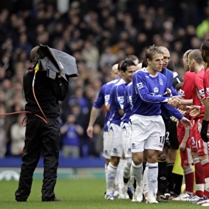 Everton v Blackburn Rovers Phil Neville leads his team as they shake hands with the Blackburn players