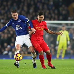Everton vs Liverpool: McCarthy vs Firmino - Intense Battle for Ball at Goodison Park