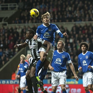 Everton's Air Battle: Ameobi vs. Jelavic in the Intense Clash at St. James Park (2-1, Premier League, 02-01-2013)