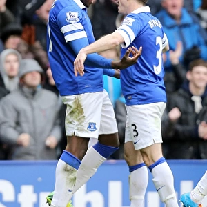 Everton's Double Strike: Lukaku and Baines Celebrate at Goodison Park