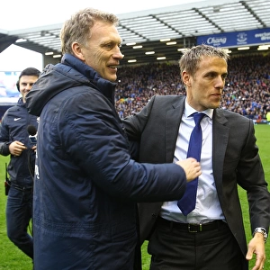 Everton's Glorious Moment: Moyes and Neville's Embrace during Victory Parade (2-0 Win over West Ham, May 12, 2013)