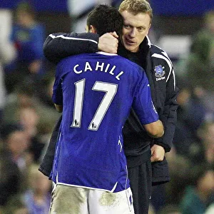 Everton's Glory: Moyes and Cahill Celebrate Premier League Victory over Portsmouth (2008)