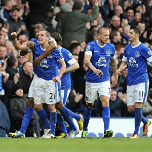 Evertons Leon Osman celebrates scoring their first goal of the game