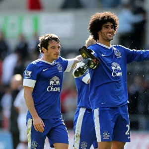 Everton's Triumph: Fellaini and Baines Celebrate Historic 3-0 Victory Over Swansea City (September 22, 2012)