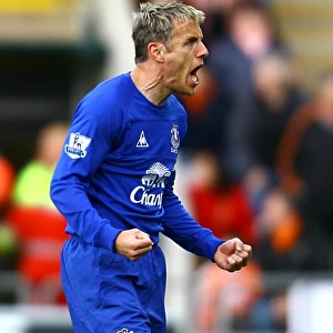 Everton's Unforgettable Moment: Neville and Cahill Celebrate Goal vs. Blackpool