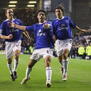 Football - Everton v Bolton Wanderers FA Barclays Premiership - Goodison Park - 06 / 07 - 18 / 11 / 06 Evertons Mikel Arteta celebrates after scoring the first goal with Nuno Valente and Leon Osman Mandatory Credit: Action Images / Carl Recine