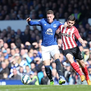 Intense Rivalry: Barkley vs. Long Battle for Ball in Everton vs. Southampton Premier League Clash