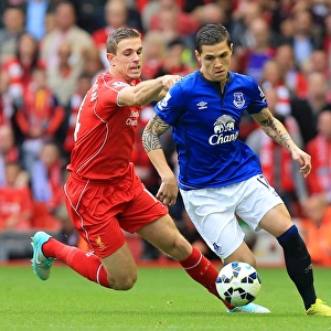 Intense Rivalry: Henderson vs. Besic - Liverpool vs. Everton, Premier League Showdown
