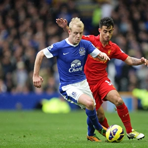 Intense Rivalry: Naismith vs. Fernandez Battle at Goodison Park - Everton vs. Liverpool (2012)