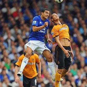 Intense Rivalry: Tim Cahill vs. Adiene Guedioura - Everton vs. Wolverhampton Wanderers Football Showdown