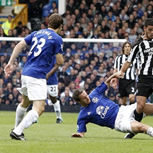Jagielka vs Ben Arfa: A Battle for the Ball - Everton vs Newcastle United (Barclays Premier League, September 18, 2010)