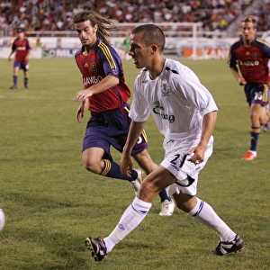 Leon Osman vs. Real Salt Lake: Intense Battle for the Ball - Everton's Midfielder Fights for Possession, July 21, 2007