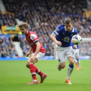 Monreal, Podolski, and Coleman's Intense Battle: Everton's Victory Over Arsenal (3-0, 2014)