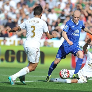 Naismith vs. Naughton: A Battle for Ball Possession - Everton vs. Swansea, Premier League