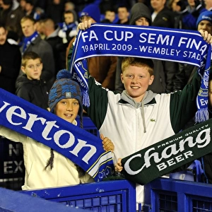Sea of Passion: Everton Fans in Full Force at Goodison Park during the Everton vs. Bolton Wanderers Match (Barclays Premier League, 10 November 2010)