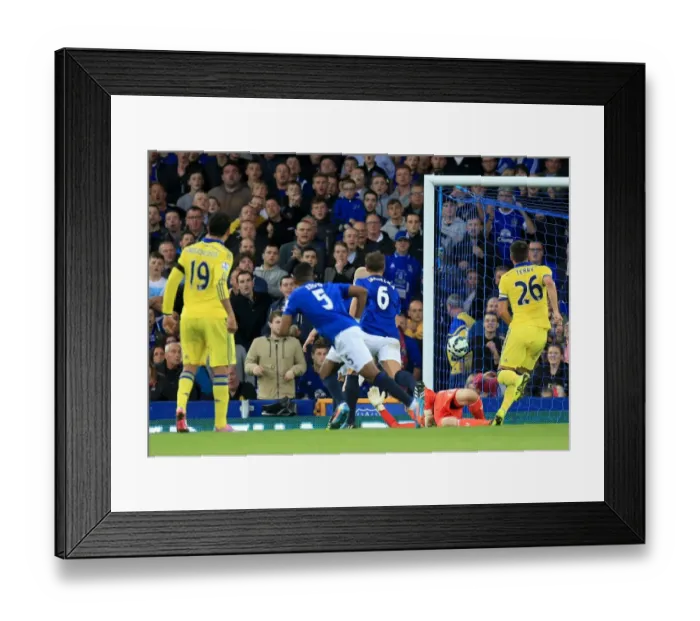 Framed Print : Eto'o Strikes Again: Everton's Triumph over Chelsea with a Hat-trick in Premier League Framed Print : Eto'o Strikes Again: Everton's Triumph over Chelsea with a Hat-trick in Premier League