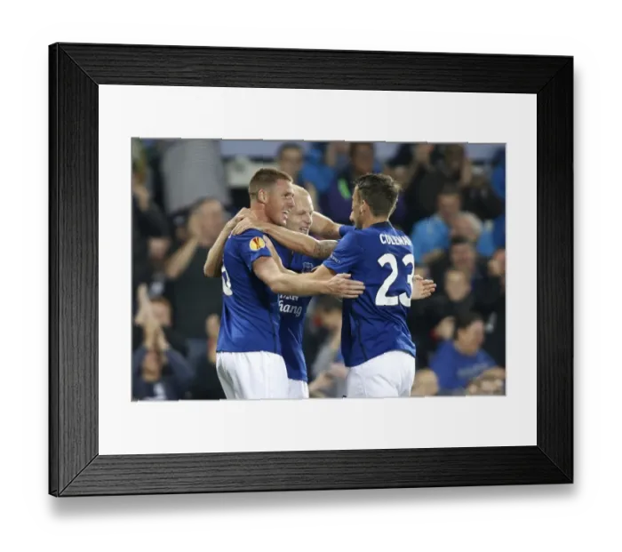 Framed Print : Everton's Europa League Victory: Naismith's Game-Changing Goals vs. VfL Wolfsburg and FK Krasnodar (UEFA Europa League - Group H)