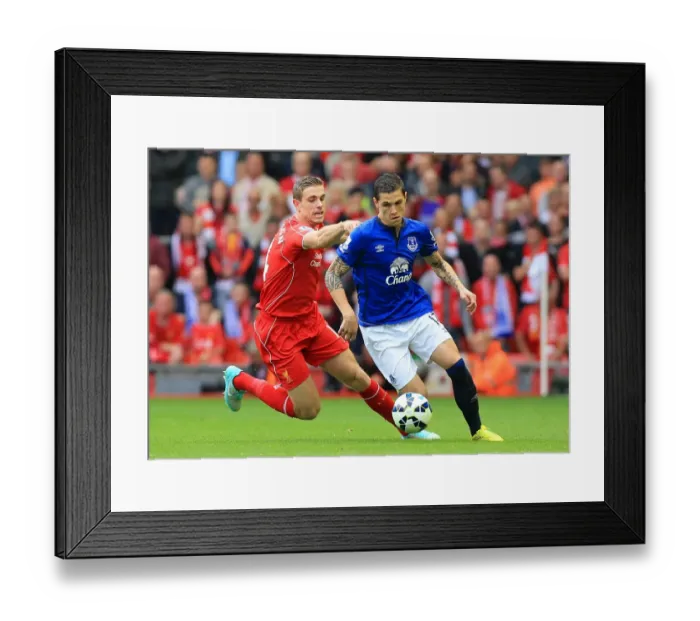 Framed Print : Intense Rivalry: Henderson vs. Besic - Liverpool vs. Everton, Premier League Showdown Framed Print : Intense Rivalry: Henderson vs. Besic - Liverpool vs. Everton, Premier League Showdown