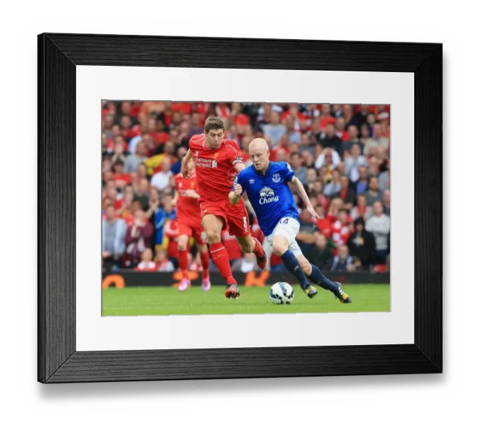 Framed Print : Intense Rivalry: Gerrard vs. Naismith Battle at Anfield - Liverpool vs. Everton, Premier League
