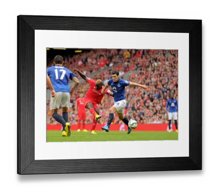 Framed Print : Intense Rivalry: Gareth Barry Blocks Mario Balotelli's Goal-bound Shot - Liverpool vs. Everton, Premier League Framed Print : Intense Rivalry: Gareth Barry Blocks Mario Balotelli's Goal-bound Shot - Liverpool vs. Everton, Premier League