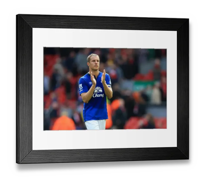 Framed Print : Phil Jagielka's Triumphant Moment: Everton's Victory Celebration at Anfield - Barclays Premier League Framed Print : Phil Jagielka's Triumphant Moment: Everton's Victory Celebration at Anfield - Barclays Premier League